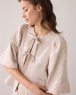 Blouse jacket with bow fastening