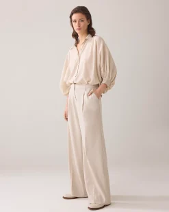 Blouse with bat sleeves