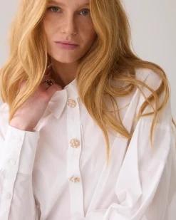 Blouse with fancy buttons