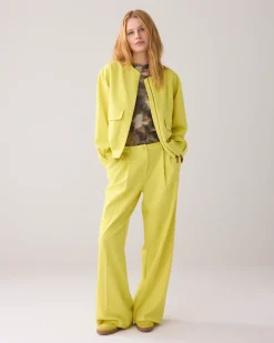 Trousers with pleated waistband