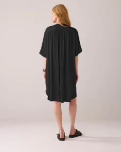 Tunic dress with button fastening